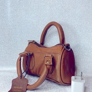 Genuine leather mini handbag.